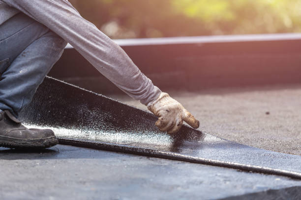 Professional Emergency Waterproofing technician working in Oakdale, PA